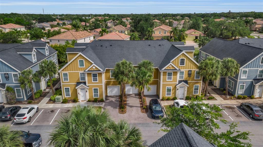 5511 Rosehill Road, Unit 203 Sarasota, FL 34233 - Photo 46 of 49 an aerial view of a residential apartment building with a yard