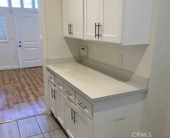 a view of a kitchen with a sink