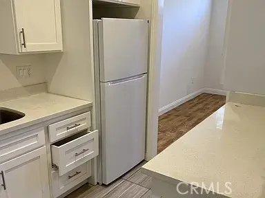 a view of a bathroom with a glass door