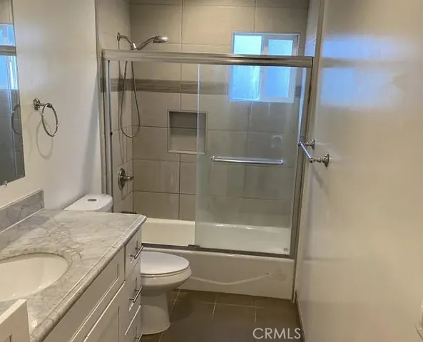 a view of a door and a window