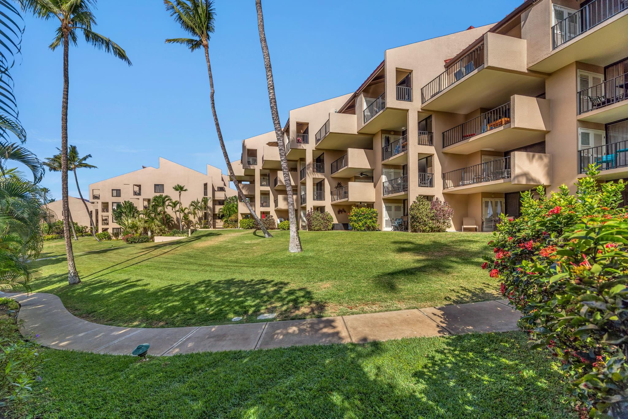 2695 South Kihei Road, Unit 3403 Kihei, HI 96753 - Photo 33 of 41 a garden view with a building in the background