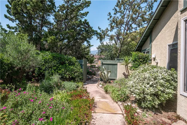 a backyard of a house with lots of green space