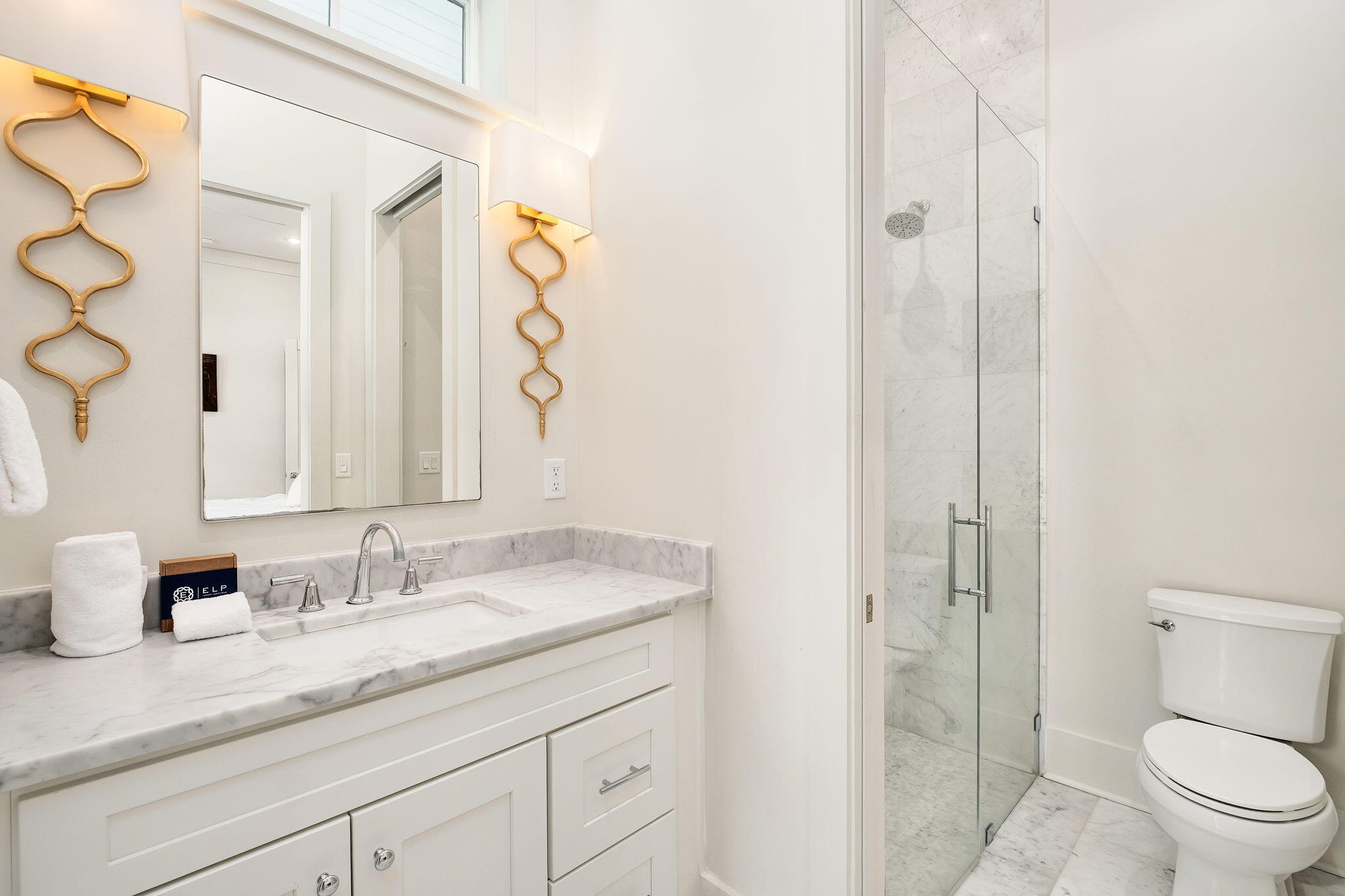 45 Mary Street Santa Rosa Beach, FL 32459 - Photo 14 of 46 a bathroom with a granite countertop sink a toilet and shower