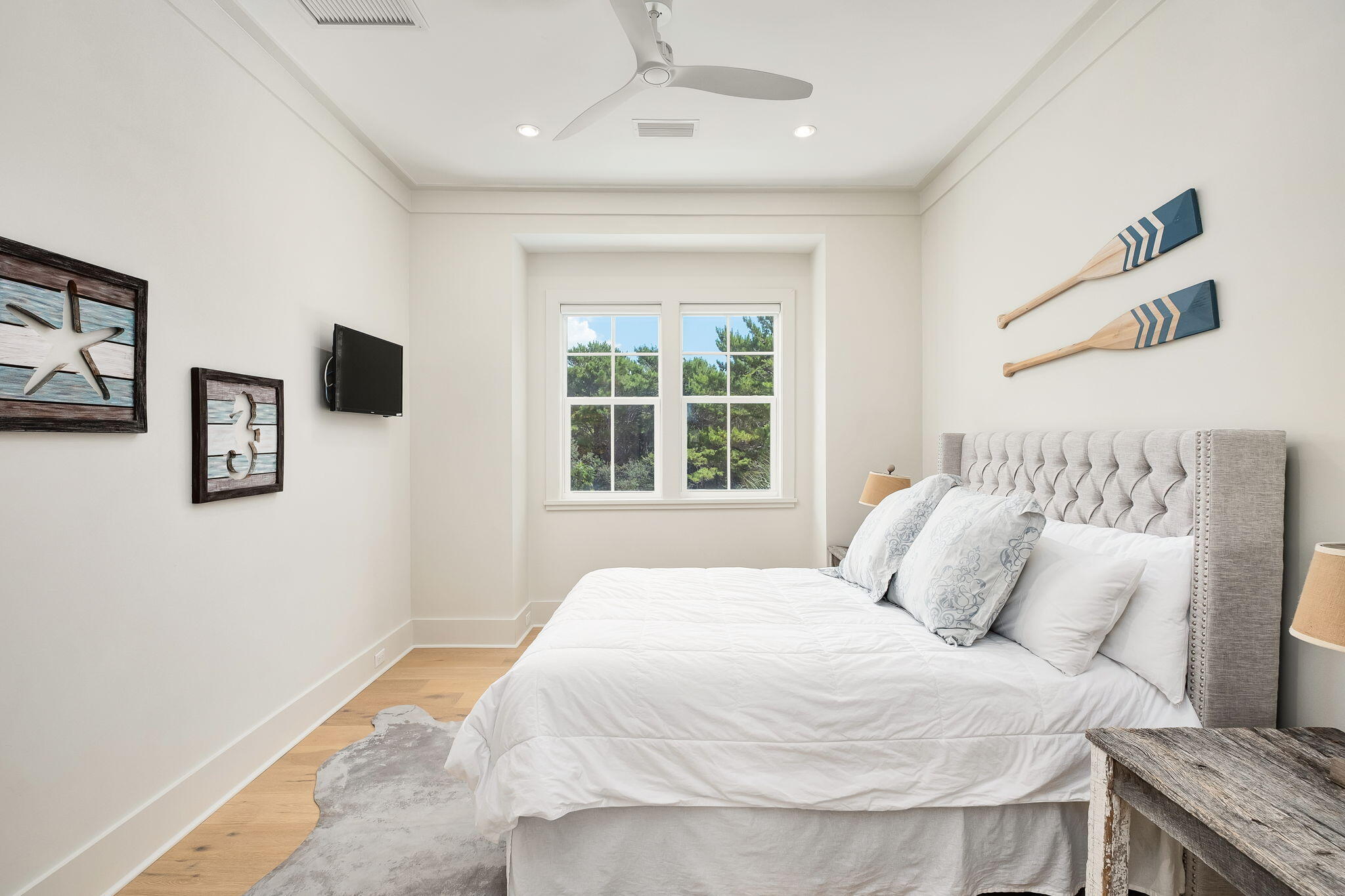 45 Mary Street Santa Rosa Beach, FL 32459 - Photo 19 of 46 a bedroom with a bed and a window