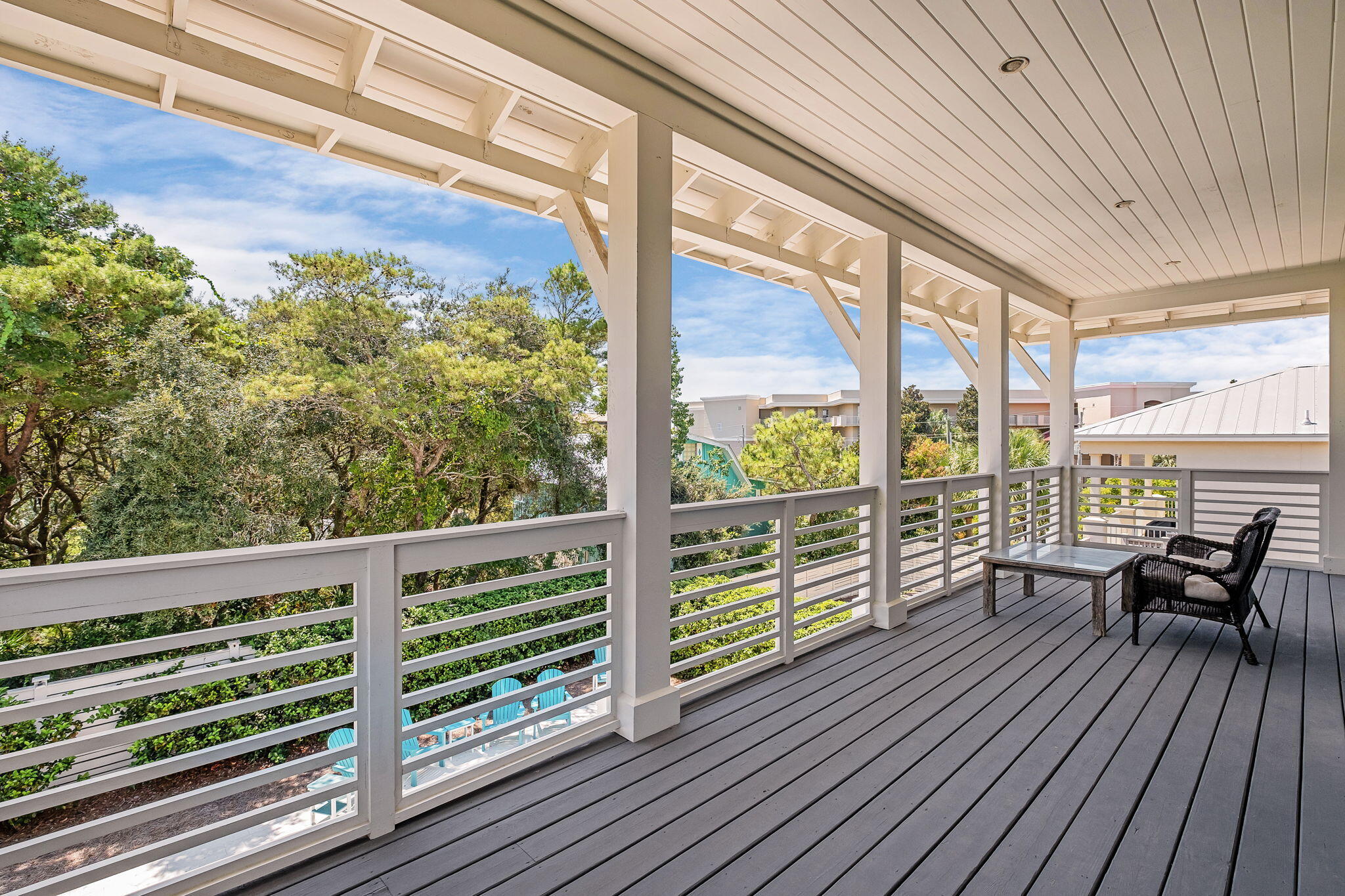 45 Mary Street Santa Rosa Beach, FL 32459 - Photo 41 of 46 a view of a balcony with lake view and wooden floor
