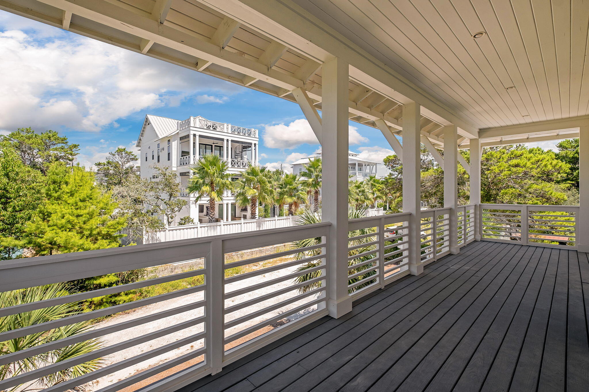45 Mary Street Santa Rosa Beach, FL 32459 - Photo 43 of 46 a view of balcony with wooden floor
