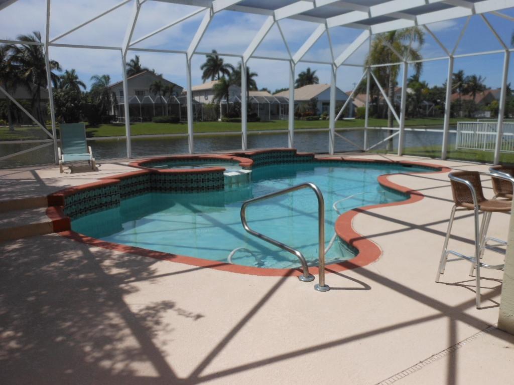 10776 Tea Olive Lane Boca Raton, FL 33498 - Photo 15 of 23 Attractive Freeform Pool & Spa