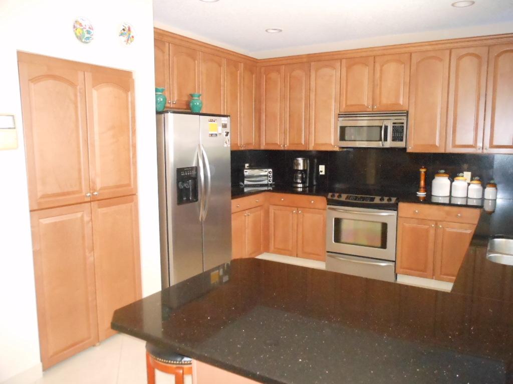 10776 Tea Olive Lane Boca Raton, FL 33498 - Photo 5 of 23 Kitchen with large pantry