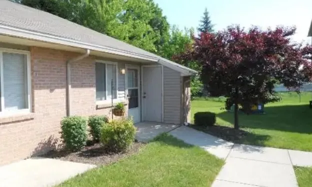 a view of a back yard of the house