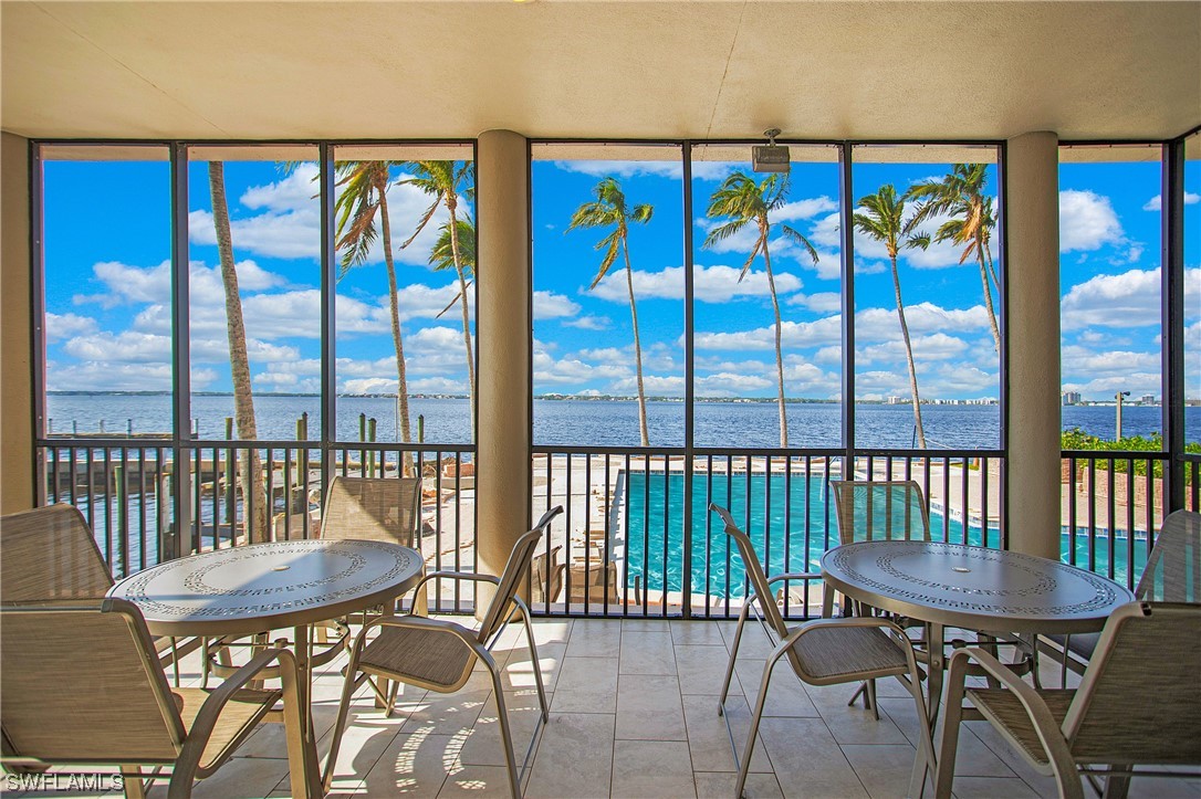 1920 Virginia Avenue, Unit 102 Fort Myers, FL 33901 - Photo 11 of 11 a view of a chairs and table in the patio
