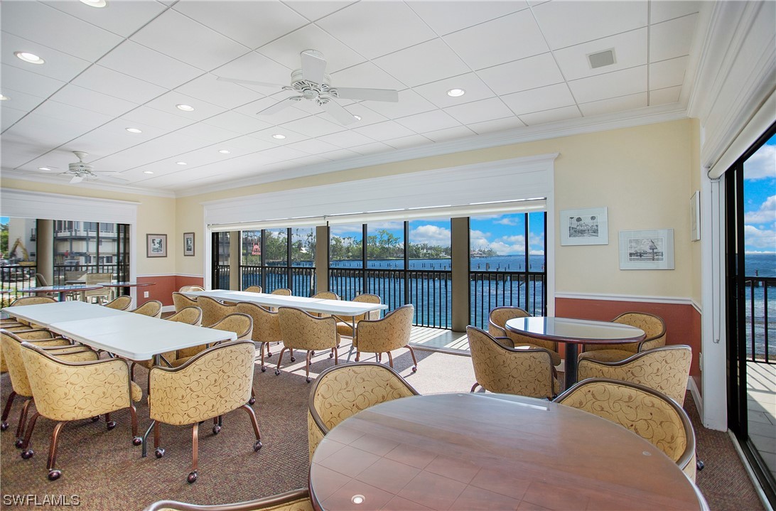 1920 Virginia Avenue, Unit 102 Fort Myers, FL 33901 - Photo 9 of 11 a view of a dining room with furniture window and outside view