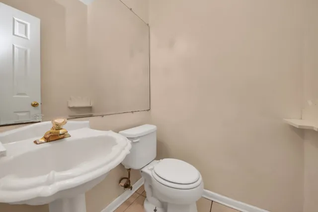 a bathroom with a sink and a toilet
