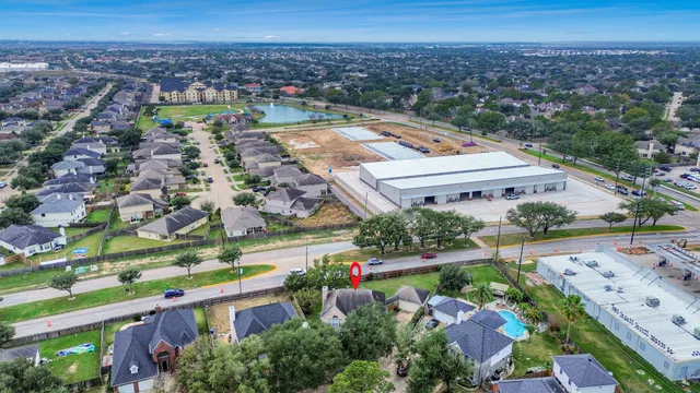 an aerial view of a house with a garden