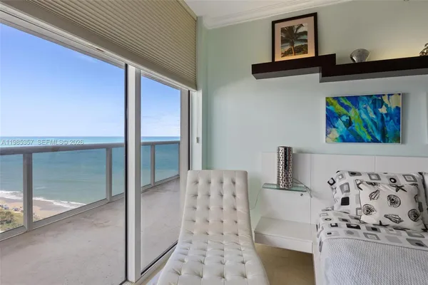a view of bedroom with window