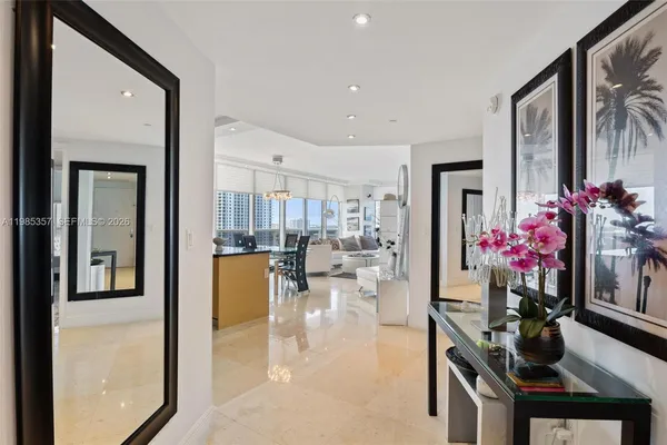 a view of a living room and a dining room