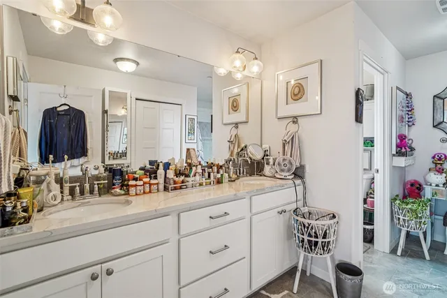 a bathroom with sink and mirror