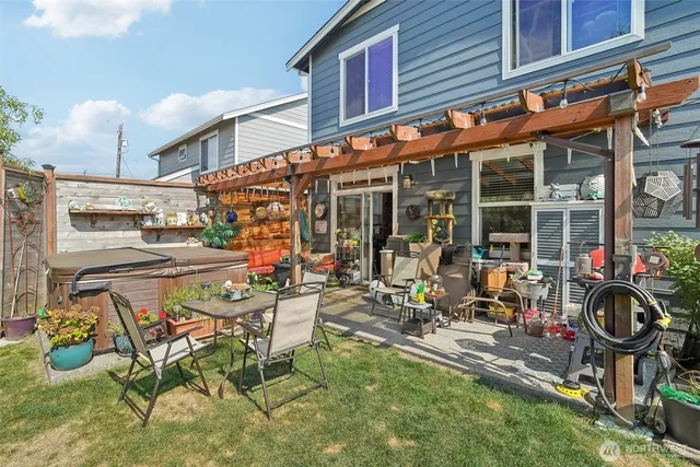 a view of a chairs and table in a patio