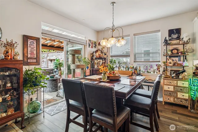 a view of a dining room with furniture window and outside view