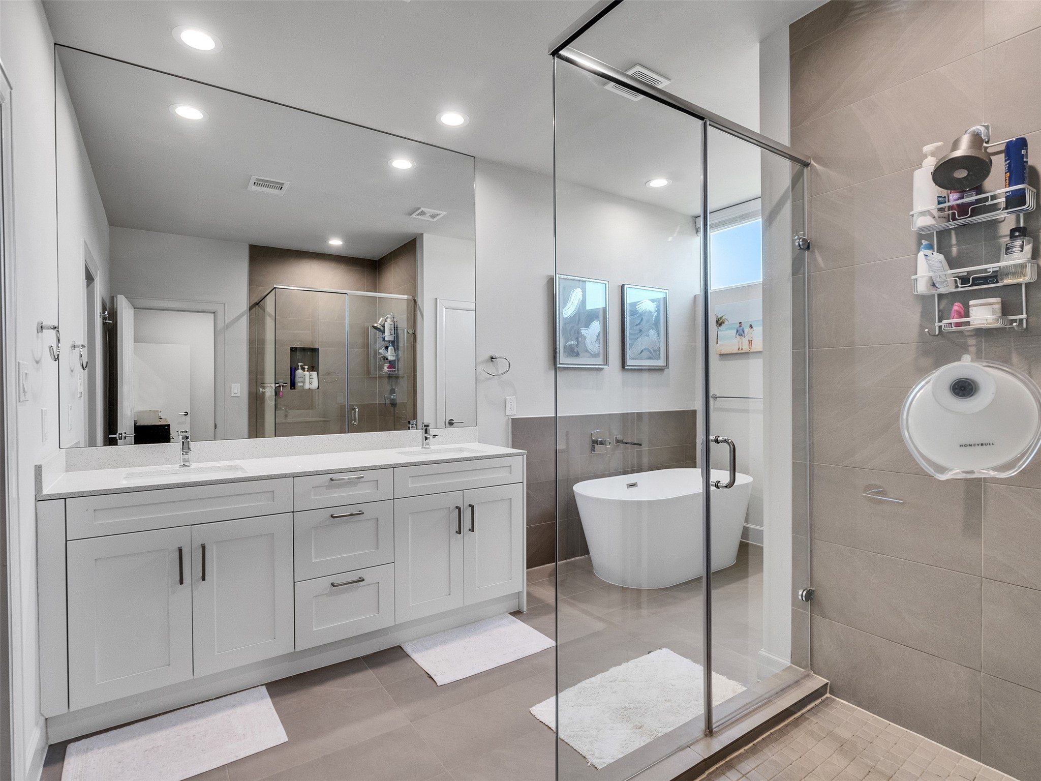 5702 Rucio Lane Houston, TX 77092 - Photo 15 of 30 a bathroom with a granite countertop sink mirror and shower