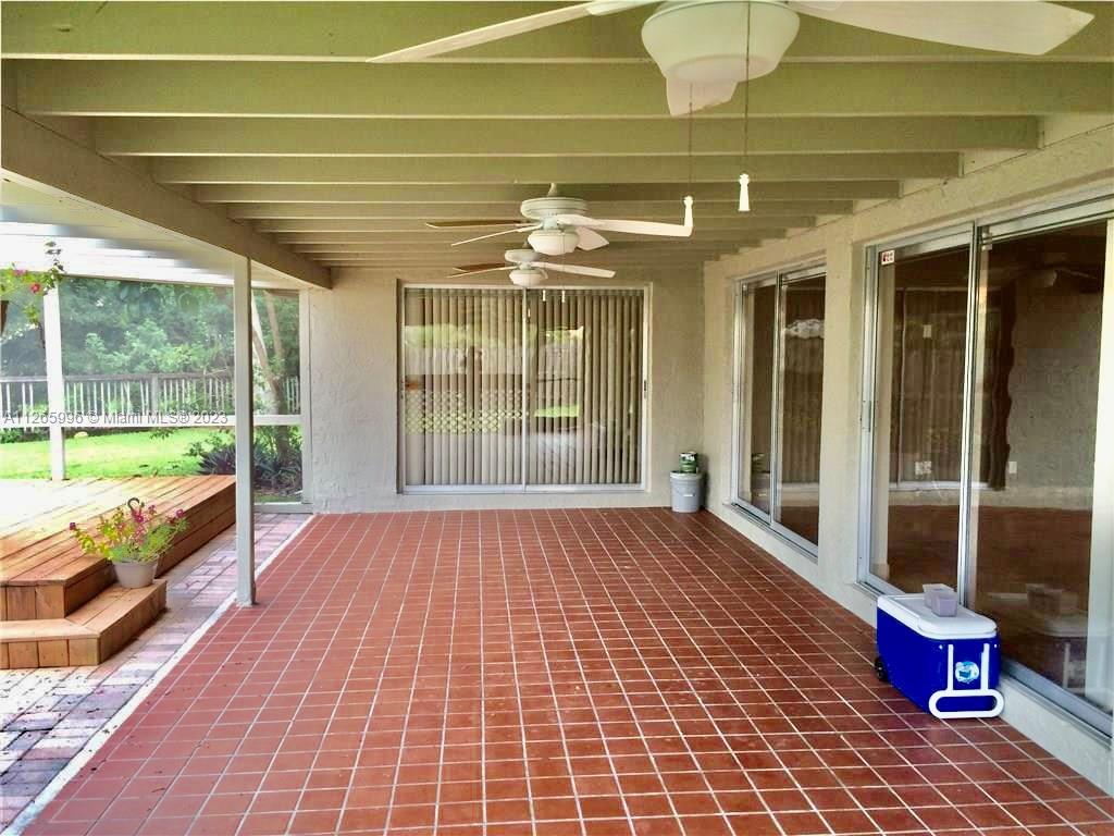 Welleby Sunrise, FL 33351 - Photo 6 of 15 a lobby with furniture and floor to ceiling window