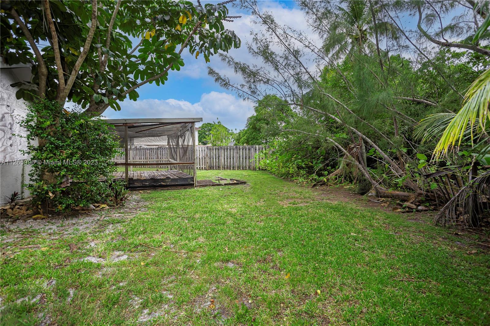 Welleby Sunrise, FL 33351 - Photo 7 of 15 a view of a house with a backyard