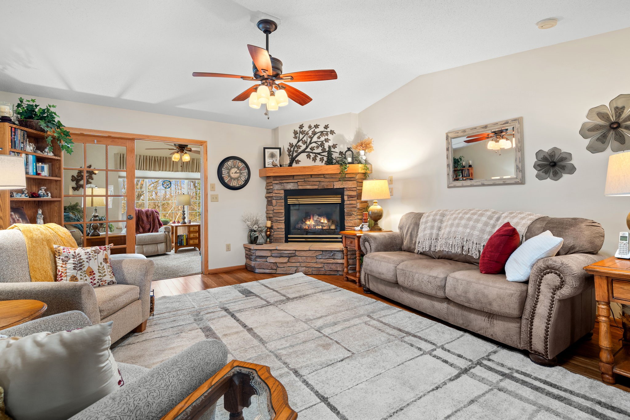 10547 Grandview Lane Hayward, WI 54843 - Photo 7 of 40 Stunning views of the gas fireplace are among the first things you see as you relax in this living room.