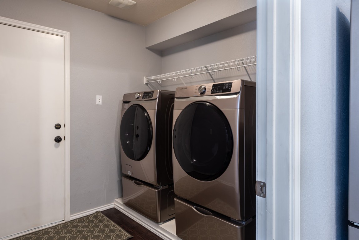 1519 Davis Mountain Loop Cedar Park, TX 78613 - Photo 13 of 39 a utility room with dryer and washer