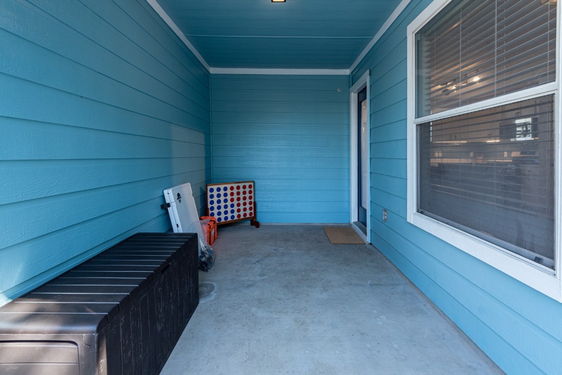 1519 Davis Mountain Loop Cedar Park, TX 78613 - Photo 33 of 39 a view of a hallway with wooden walls and stairs