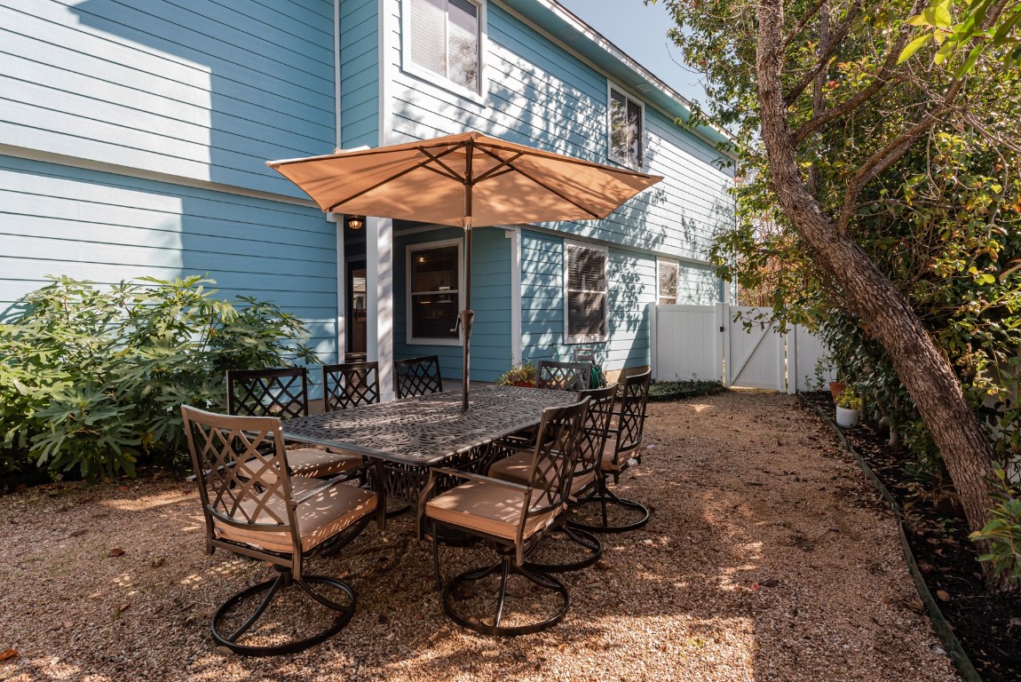 1519 Davis Mountain Loop Cedar Park, TX 78613 - Photo 35 of 39 a backyard of a house with table and chairs