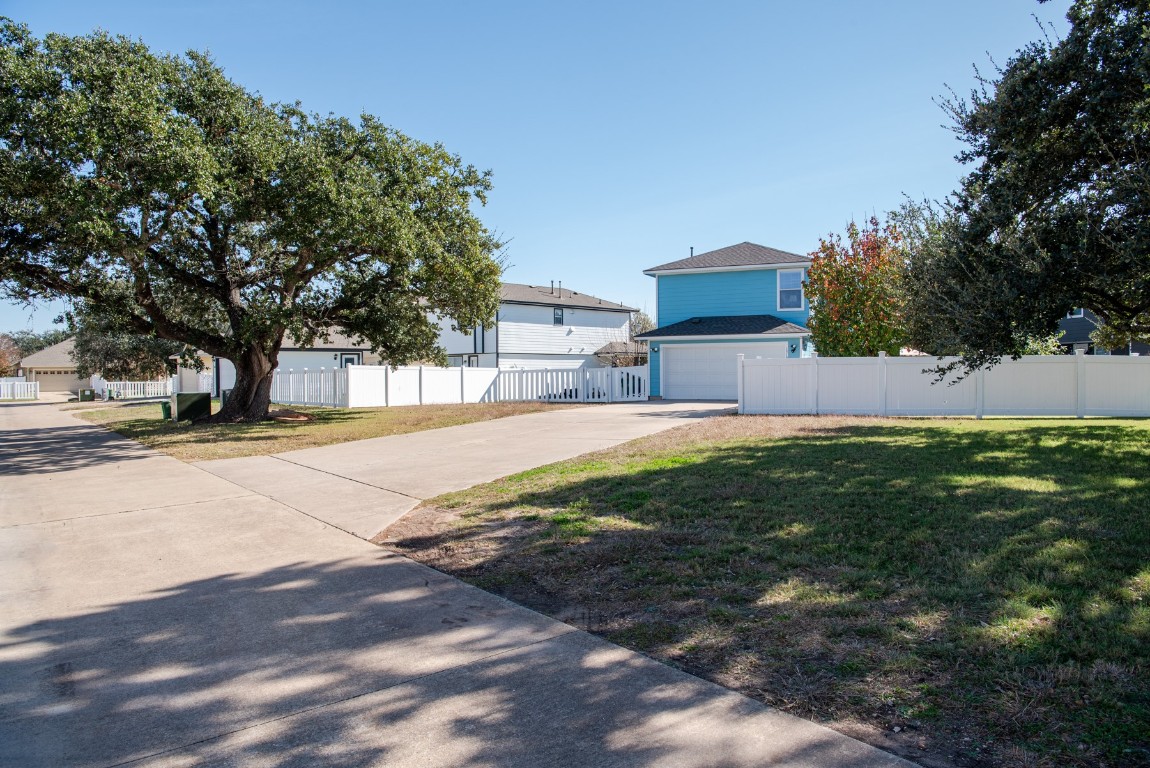 1519 Davis Mountain Loop Cedar Park, TX 78613 - Photo 39 of 39 a view of road with large trees