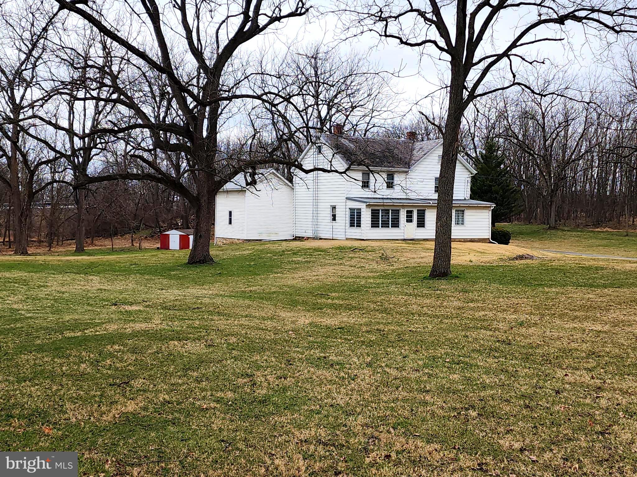 1376 Nolts Road Chambersburg, PA 17202 - Photo 1 of 15 a view of a house with a yard