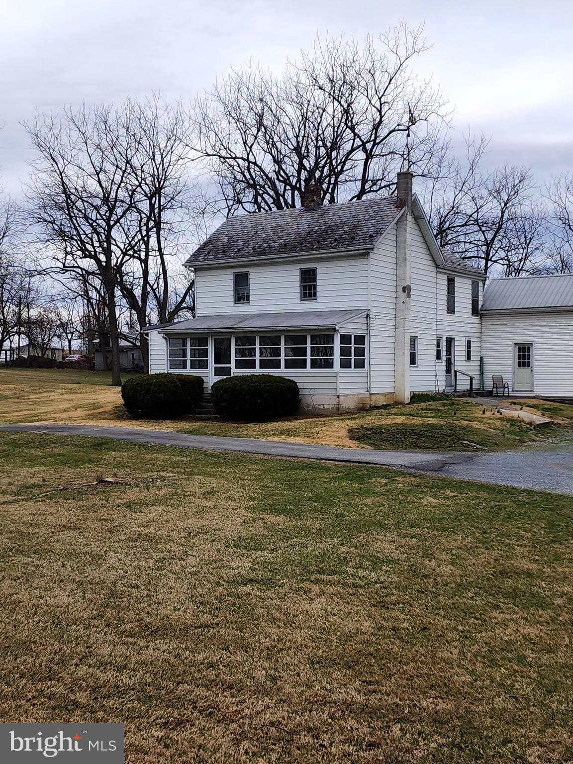 1376 Nolts Road Chambersburg, PA 17202 - Photo 2 of 15 a house with swimming pool in front of it