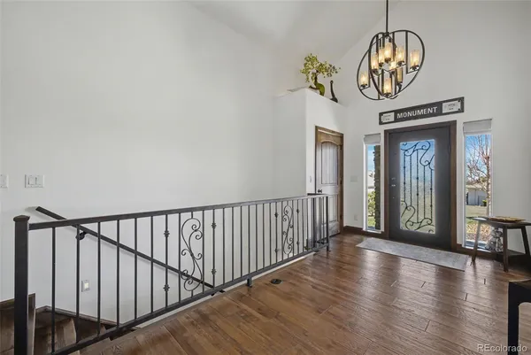 a view of entryway with wooden floor