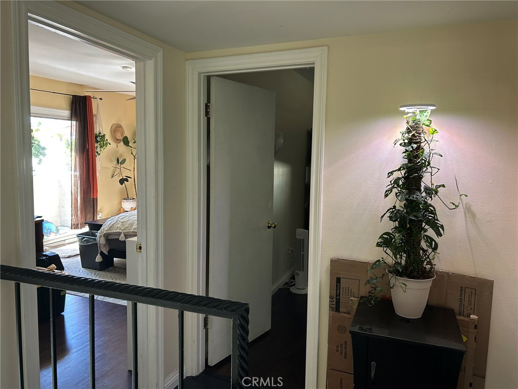 2305 Rockefeller Lane, Unit A Redondo Beach, CA 90278 - Photo 11 of 53 a room with a flower pot and a potted plant