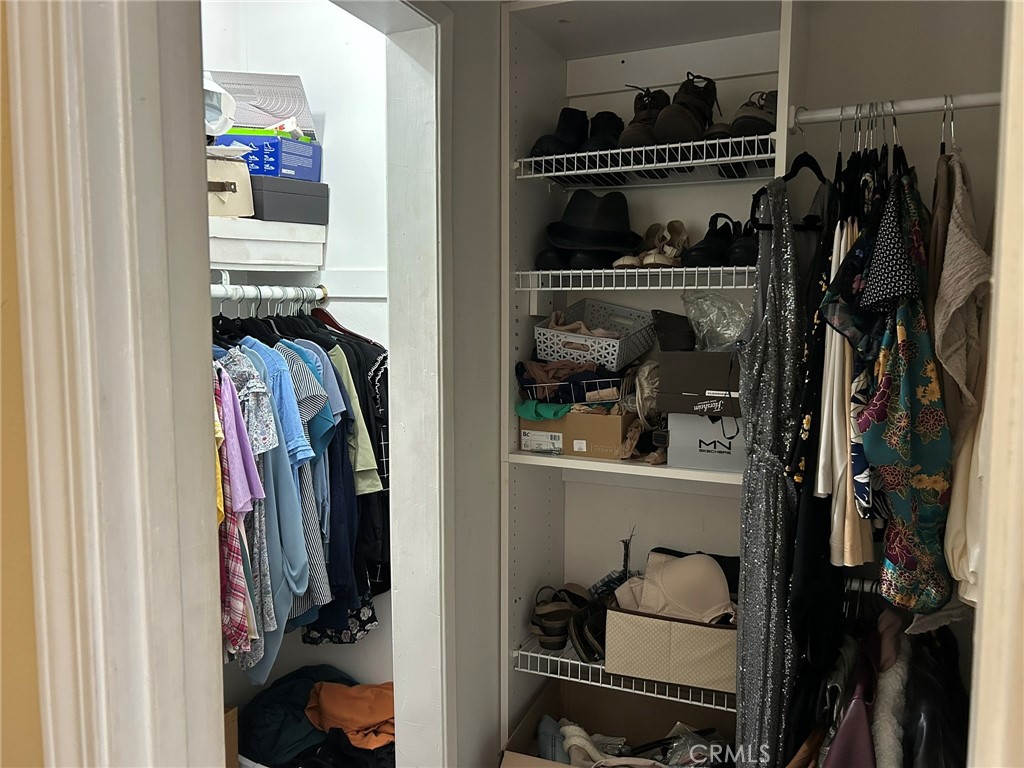 2305 Rockefeller Lane, Unit A Redondo Beach, CA 90278 - Photo 19 of 53 a view of walk in closet with clothes and shoes