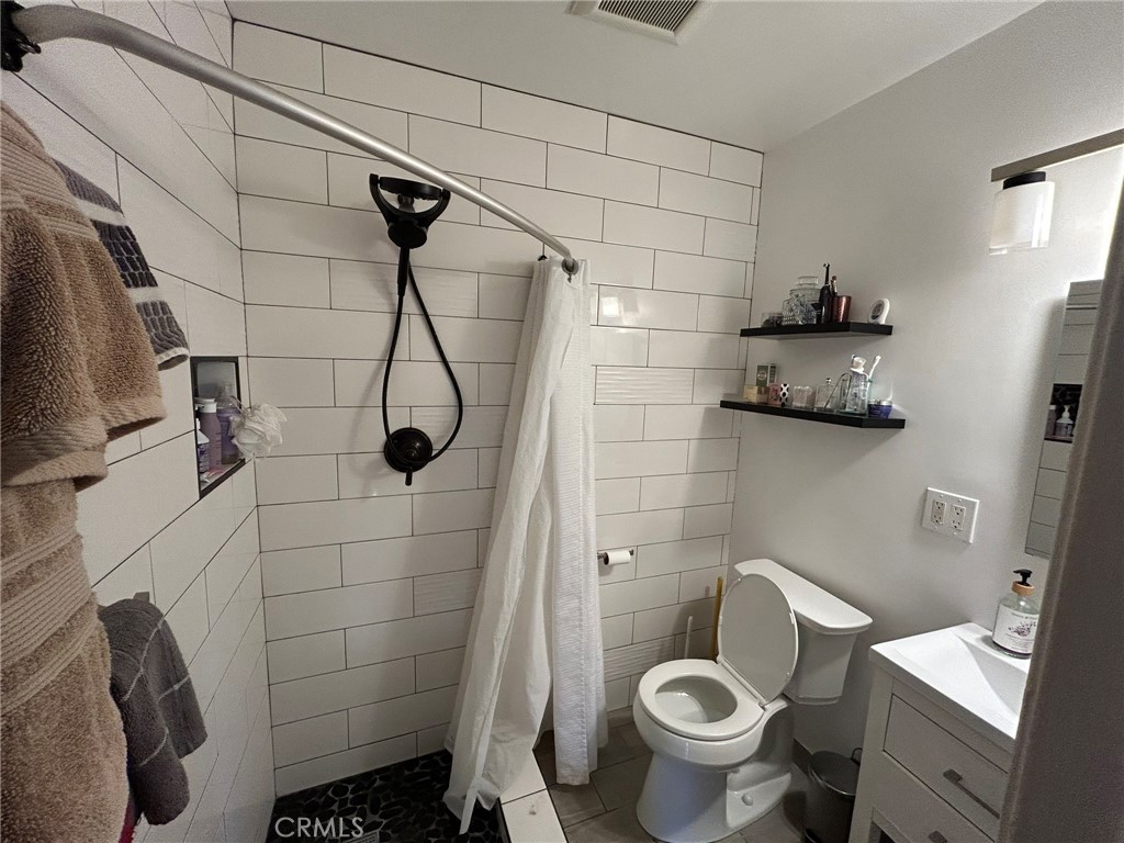 2305 Rockefeller Lane, Unit A Redondo Beach, CA 90278 - Photo 21 of 53 a bathroom with a toilet and a shower