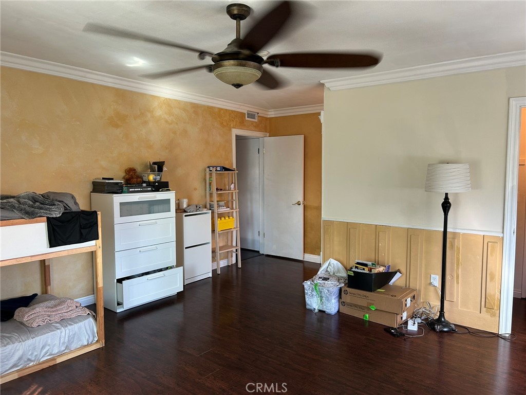 2305 Rockefeller Lane, Unit A Redondo Beach, CA 90278 - Photo 34 of 53 a room with furniture and a ceiling fan