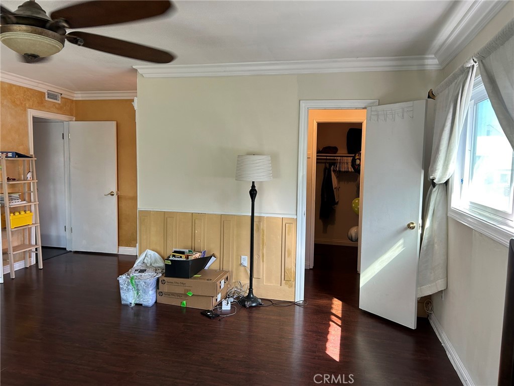 2305 Rockefeller Lane, Unit A Redondo Beach, CA 90278 - Photo 35 of 53 a room with wooden floor and a ceiling fan