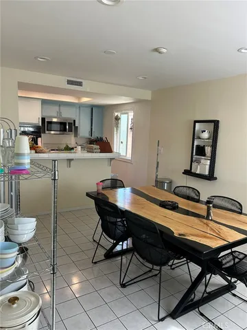 a kitchen that has a sink and a stove