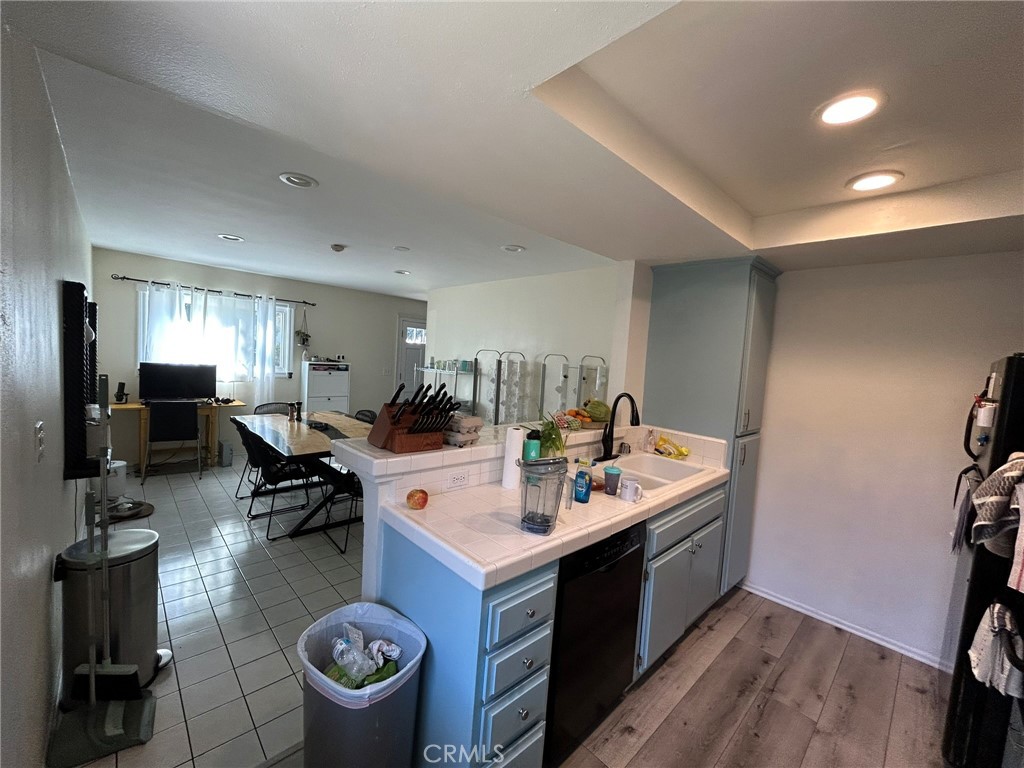 2305 Rockefeller Lane, Unit A Redondo Beach, CA 90278 - Photo 40 of 53 a open kitchen with a sink appliances and wooden floor
