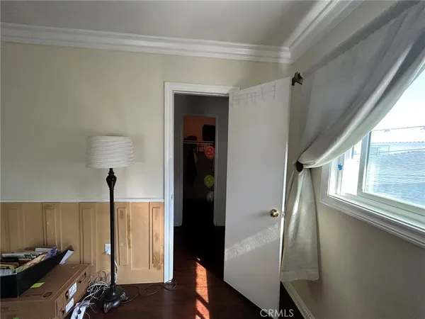 a bathroom with a toilet and shower