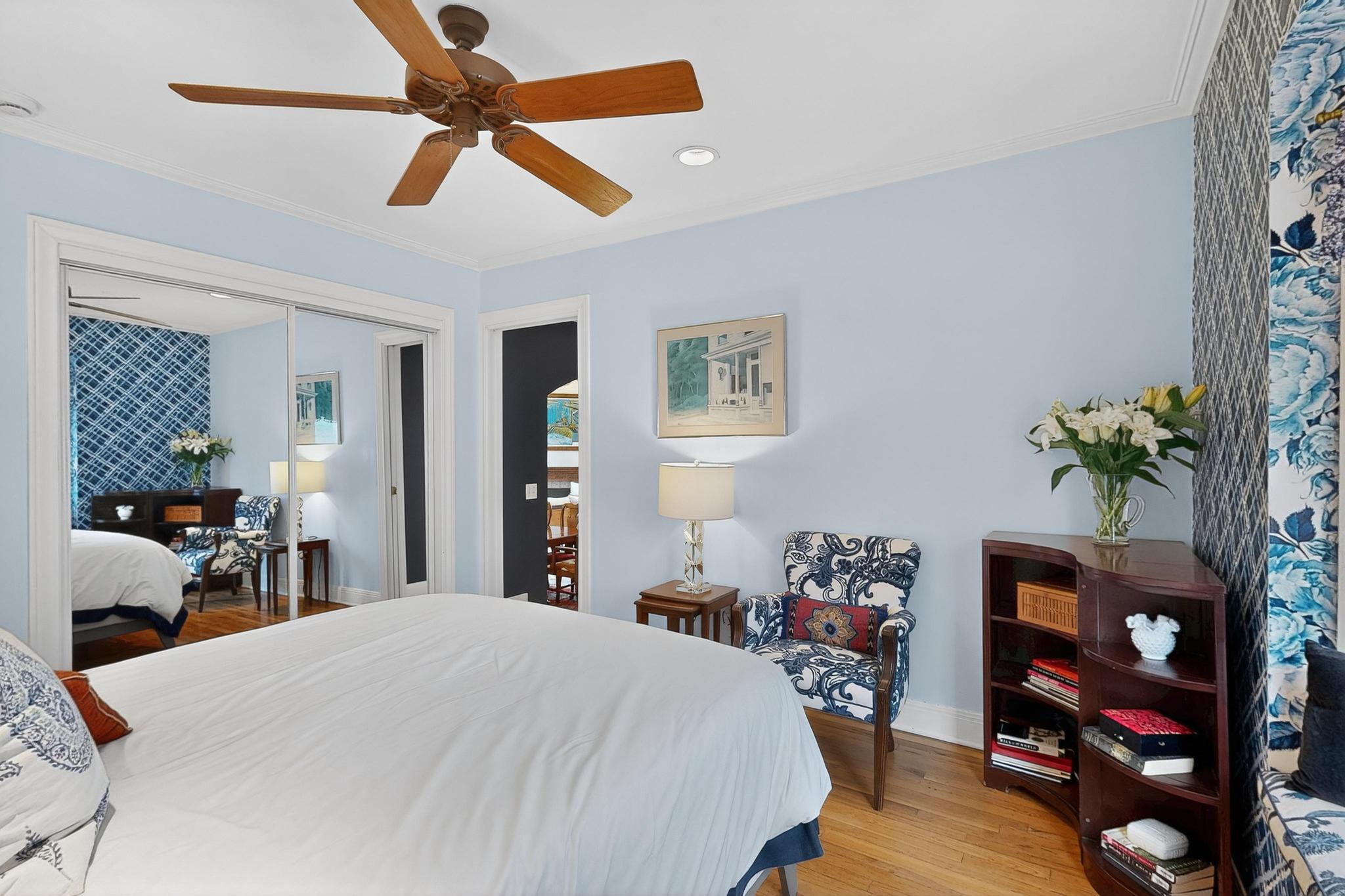 1906 Collier Street Austin, TX 78704 - Photo 22 of 40 a bedroom with a bed and a chandelier