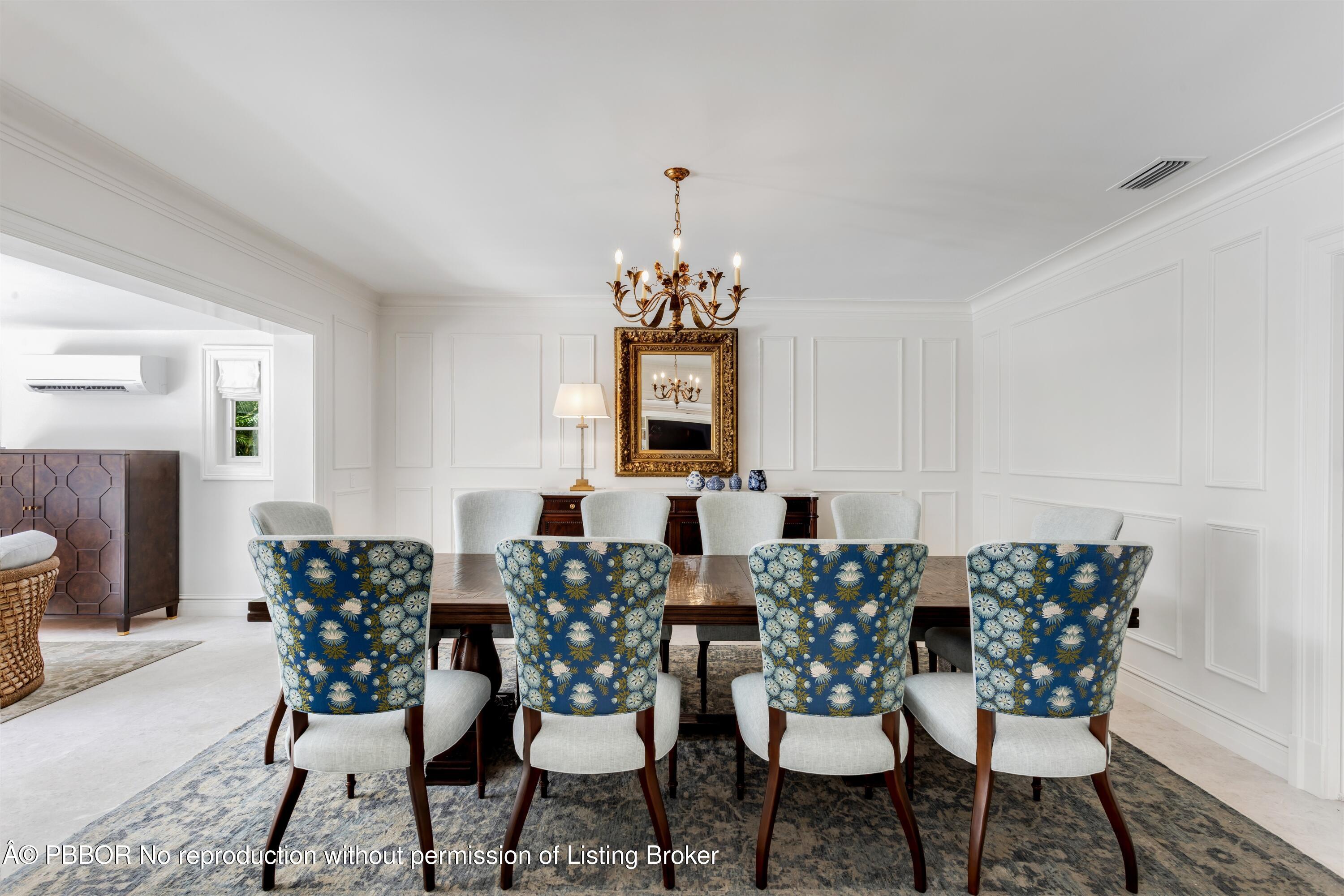 124 Woodbridge Road Palm Beach, FL 33480 - Photo 16 of 44 a view of a dining room with furniture and window