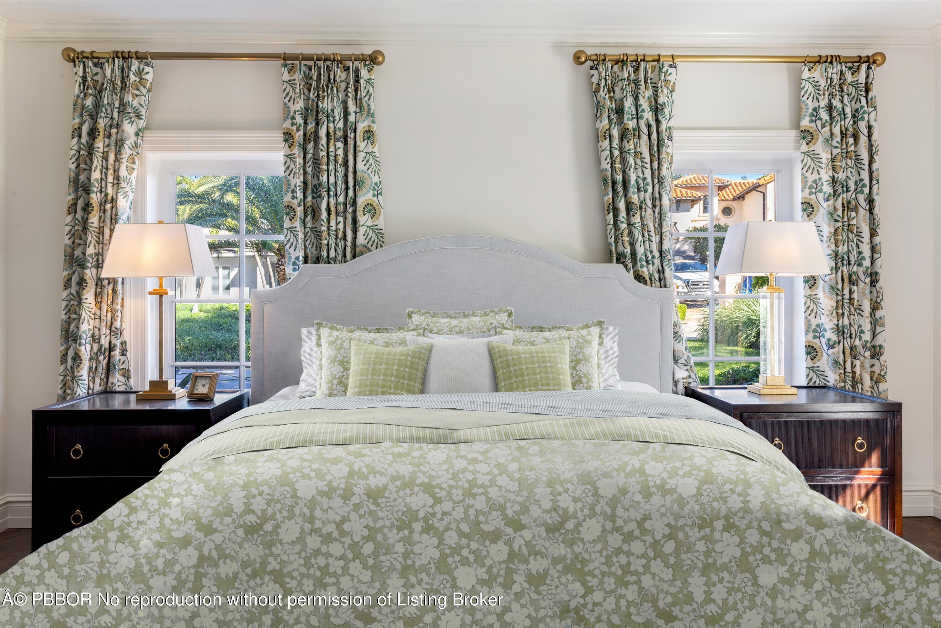 124 Woodbridge Road Palm Beach, FL 33480 - Photo 29 of 44 a large bed sitting in a bedroom next to a window