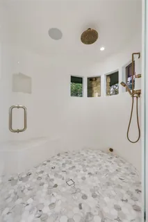 a view of a room with wooden floor and wall