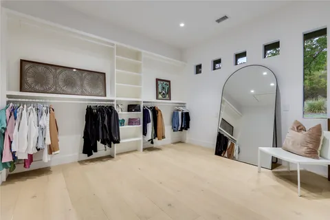 a view of a livingroom with furniture and a flat screen tv