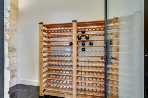 a view of a bathroom with a black and white checkered floor