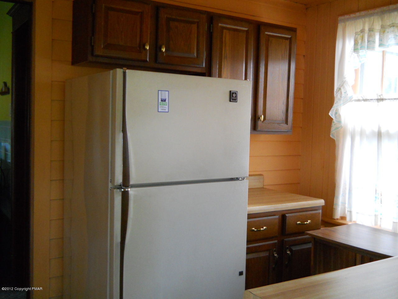887 Bangor Road Nazareth, PA 18064 - Photo 3 of 11 a white refrigerator freezer sitting inside of a kitchen
