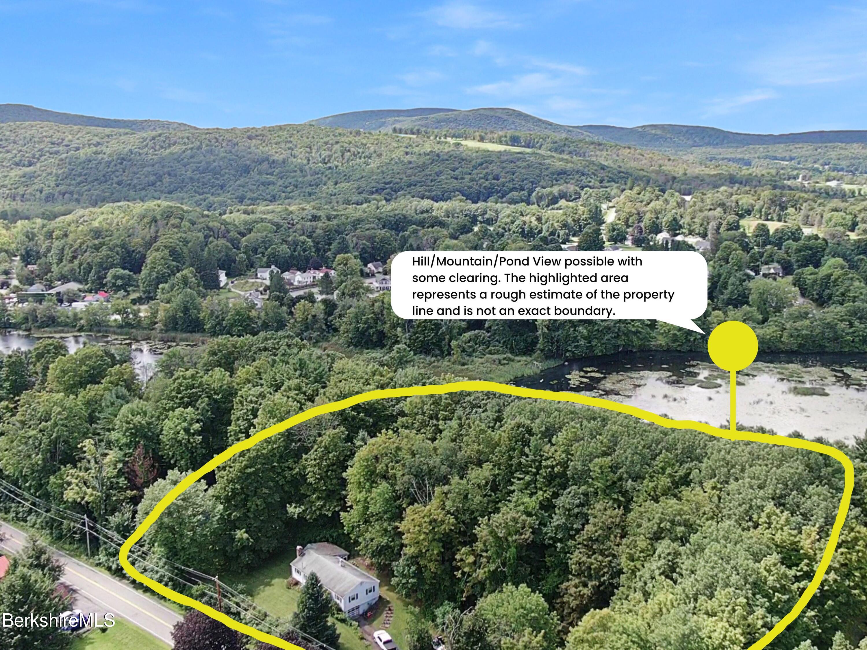 27 Swamp Road West Stockbridge, MA 01266 - Photo 7 of 45 a view of a swimming pool with a yard and mountain view