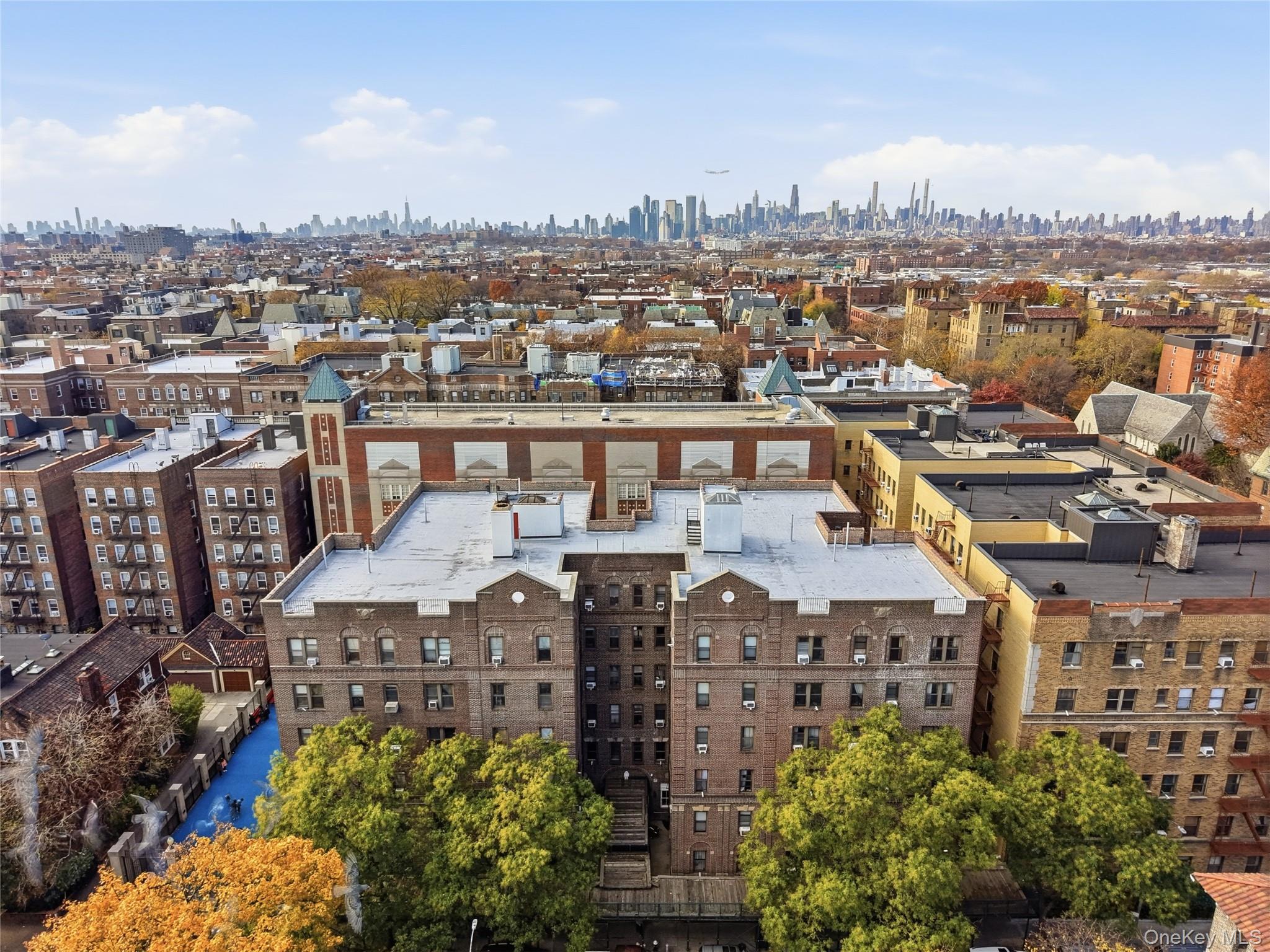 34-20 83rd Street, Unit 2D Queens, NY 11372 - Photo 9 of 11 Drone / aerial view of city skyline